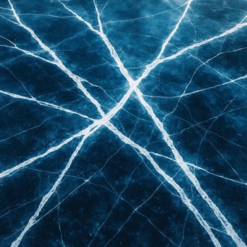 Pattern of long cracks on a frozen lake with blue reflections
